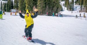 Snowboarder in a banana suit at Winter Park Resort for Gaper Day