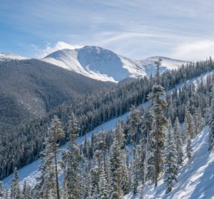 Perry's Peak view on a snowy day at Winter Park Resort